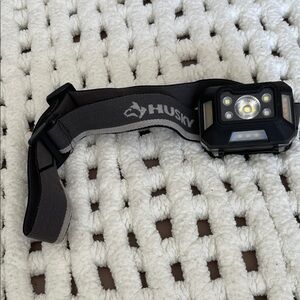Husky Black Headlamp,rechargeable. Beam and Broad range. Adjustable. GUC